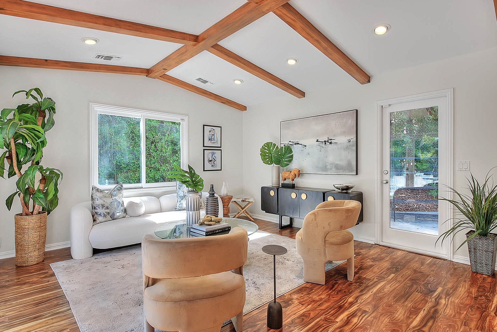 Staged family room with beamed ceiling — home staging