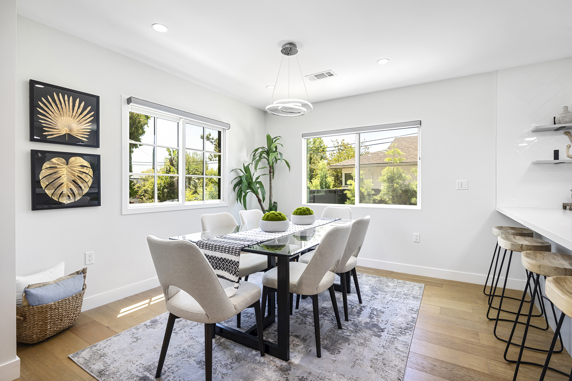 Staged dining room with art wall — home staging, Greater Los Angeles