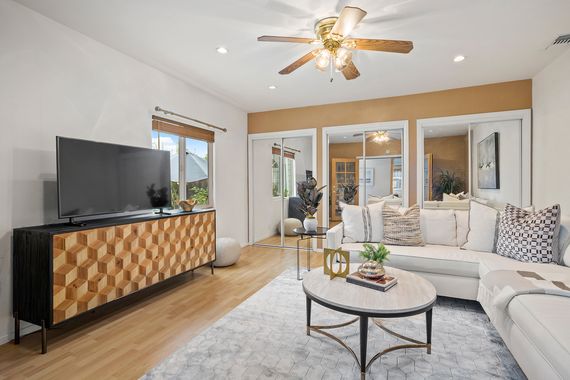 Staged family room with built-in cabinet — home staging