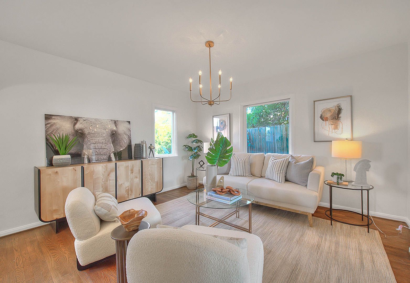 Staged living room with statement art — home staging for vacant property